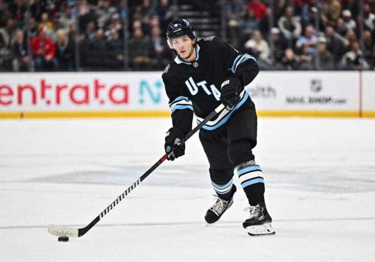 SALT LAKE CITY, UTAH - JANUARY 14: John Marino #6 of the Utah Hockey Club passes the puck during the first period of a game against the Montreal Canadiens on January 14, 2025 at Delta Center in Salt Lake City, Utah. (Photo by Jamie Sabau/NHLI via Getty Images)