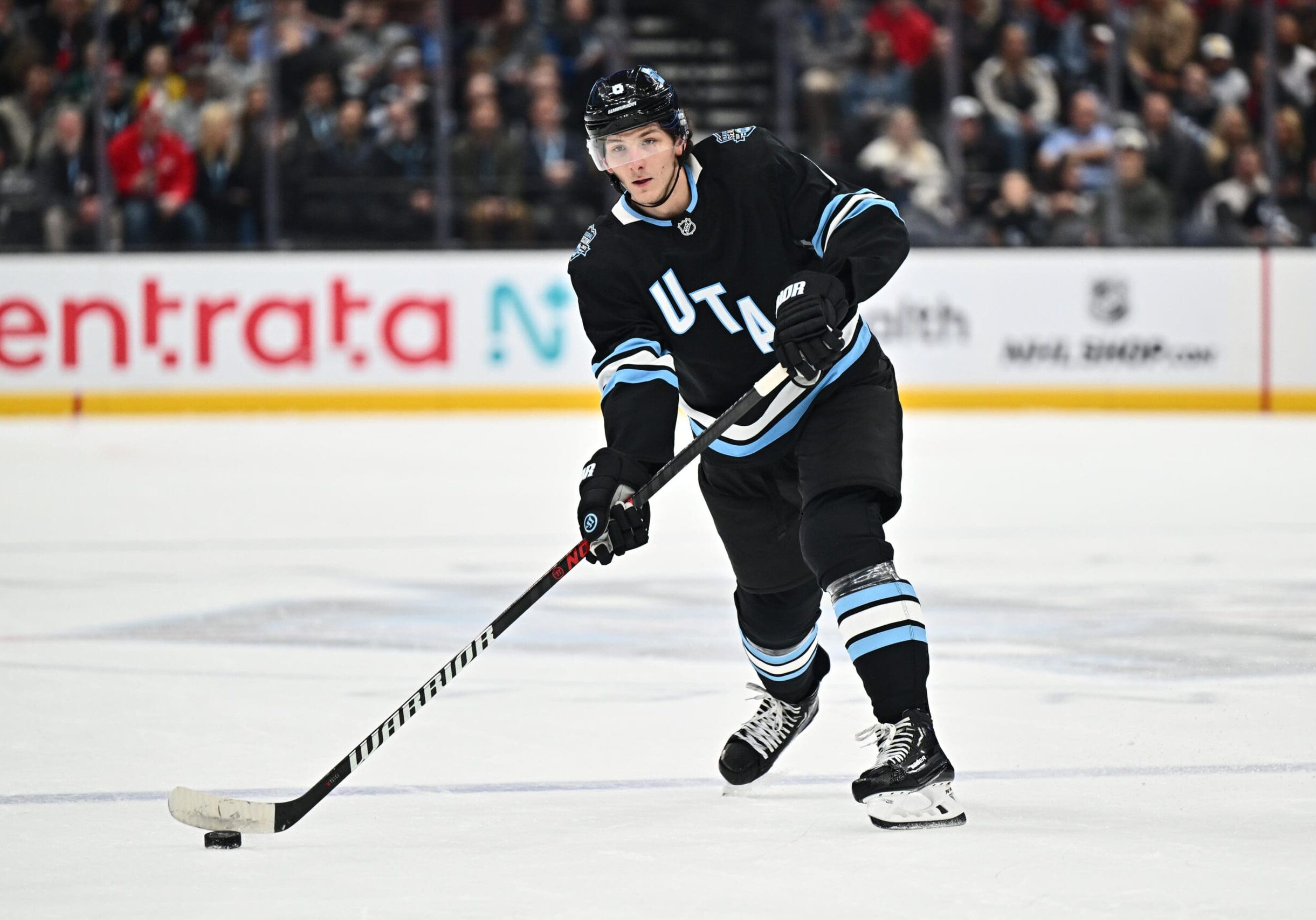 SALT LAKE CITY, UTAH - JANUARY 14: John Marino #6 of the Utah Hockey Club passes the puck during the first period of a game against the Montreal Canadiens on January 14, 2025 at Delta Center in Salt Lake City, Utah. (Photo by Jamie Sabau/NHLI via Getty Images)