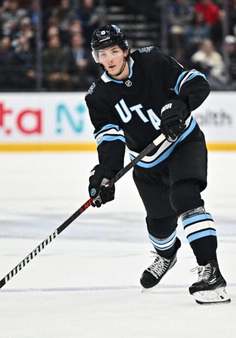 SALT LAKE CITY, UTAH - JANUARY 14: John Marino #6 of the Utah Hockey Club passes the puck during the first period of a game against the Montreal Canadiens on January 14, 2025 at Delta Center in Salt Lake City, Utah. (Photo by Jamie Sabau/NHLI via Getty Images)